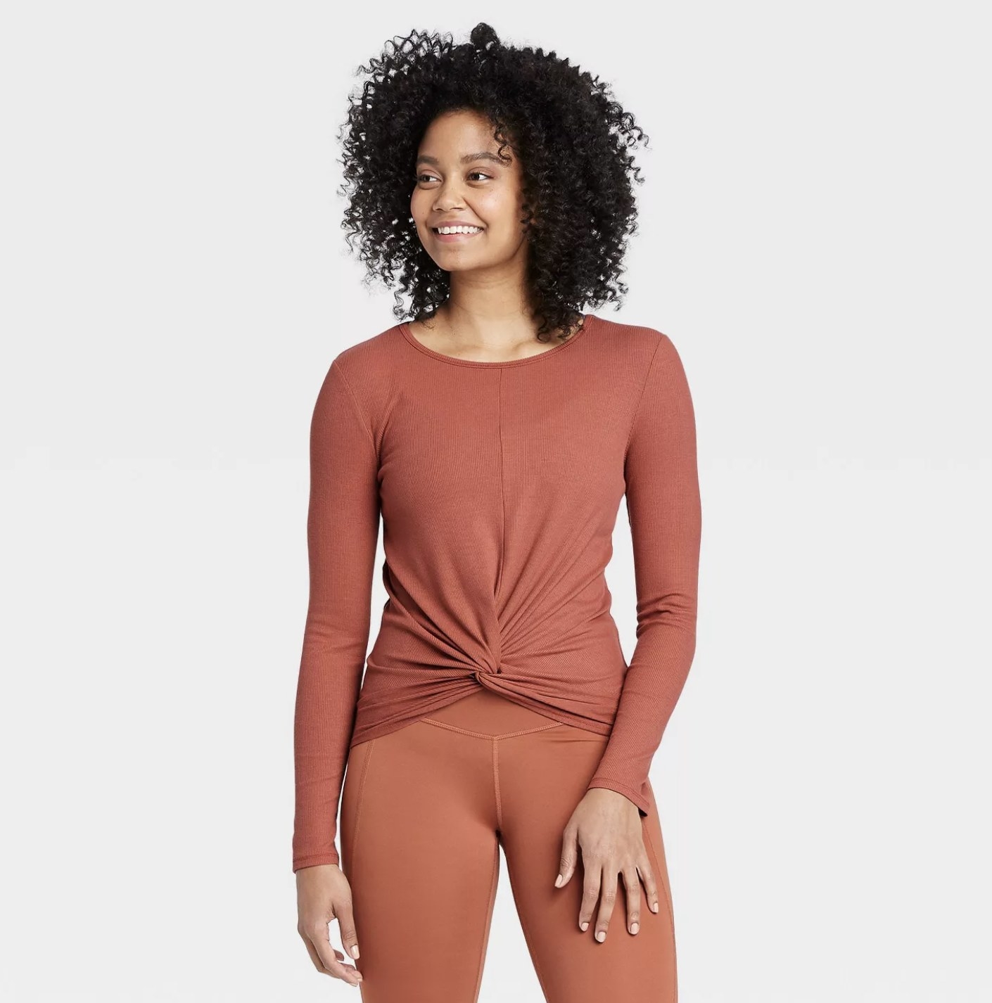 The burnt orange top with front knot 