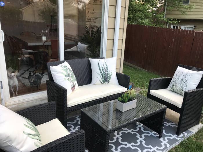 Reviewer uses the same decorative throw pillows on her patio sofa
