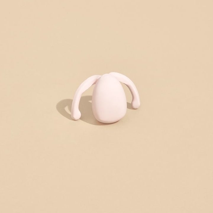 teardrop-shaped vibrator with flexible wings on sides