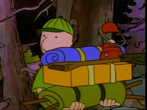 gif of Doug from the cartoon "Doug" holding a bunch of camping gear