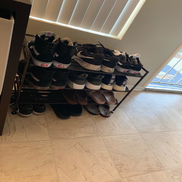 The same reviewer's shoes organized neatly on the shoe rack