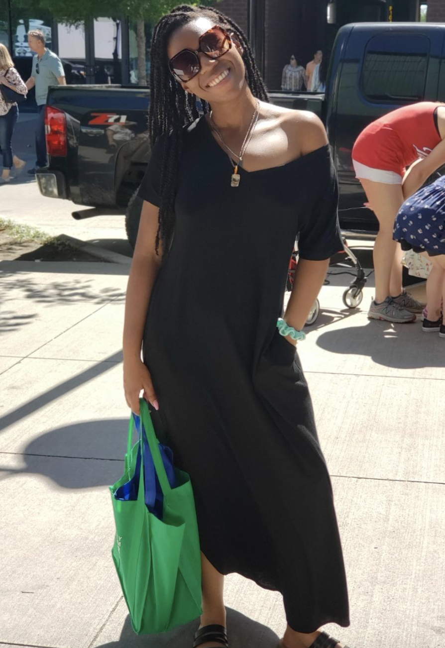 reviewer wearing maxi dress in black  