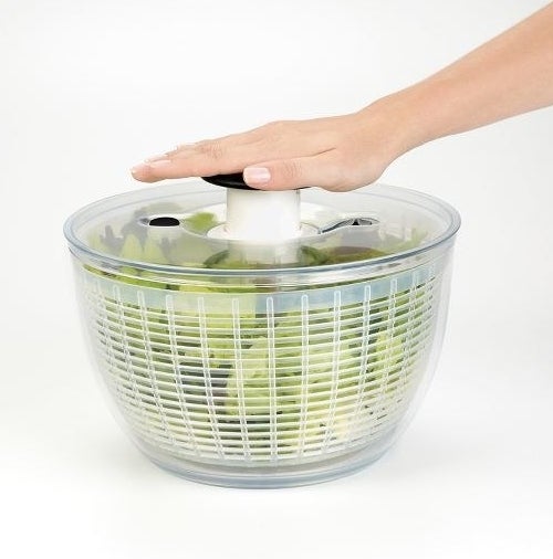 a clear salad spinner