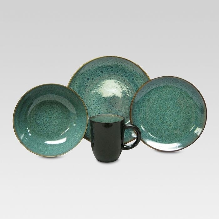 green glazed dishes and a matching mug