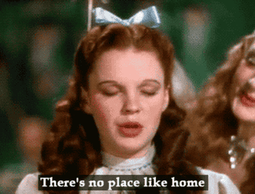 Dorothy from the Wizard of Oz has her eyes closed and says &quot;There&#x27;s no place like home&quot;