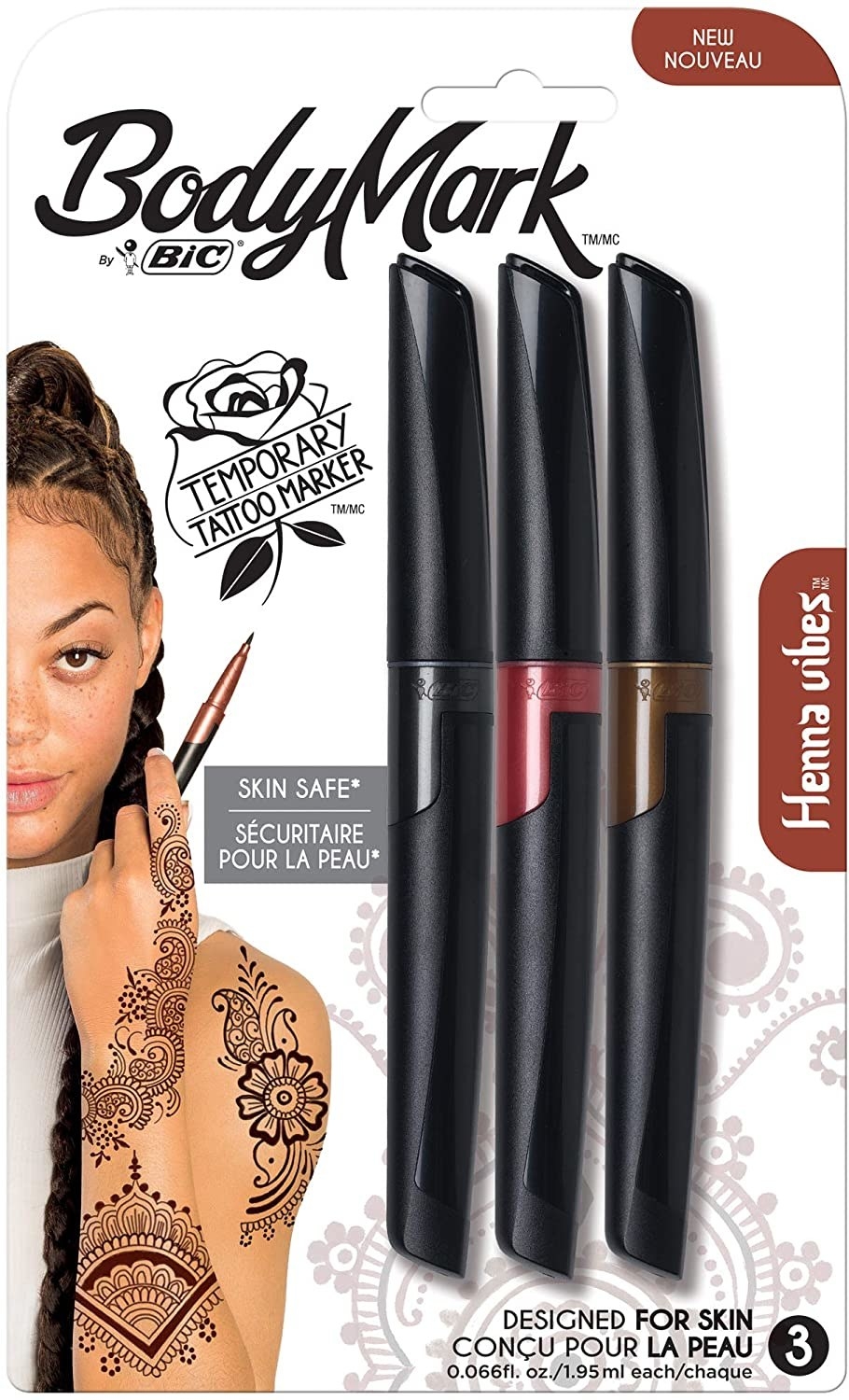 A package with three markers with a person in it that has henna designs