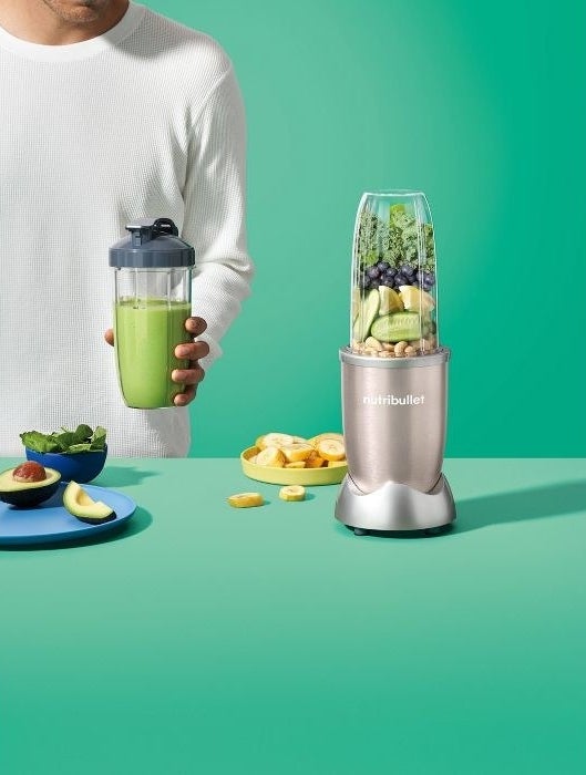 personal-sized NutriBullet with silver bottom and clear glass top 