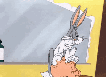 Bugs Bunny massages Elmer Fudd&#x27;s head with his hands and feet