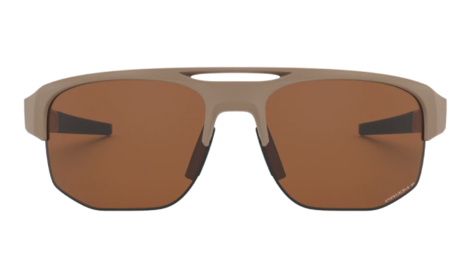 A pair of squared sunglasses with matte top frames sit on a plain background