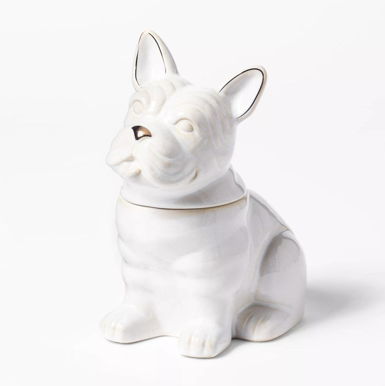A white ceramic bulldog-shaped cookie jar with gold accents