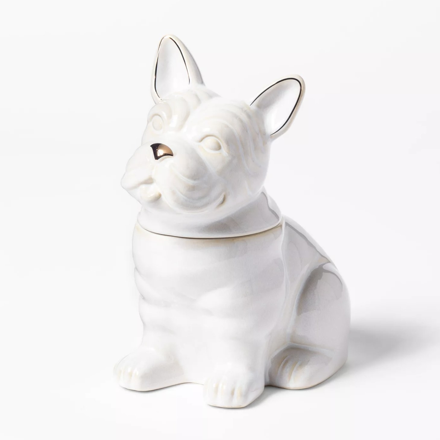 A white ceramic bulldog-shaped cookie jar with gold accents 