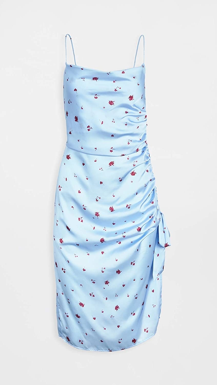 The dress in blue with small red flowers on it
