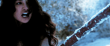 Crystal Reed as Marie-Jeanne in a flashback with the beast