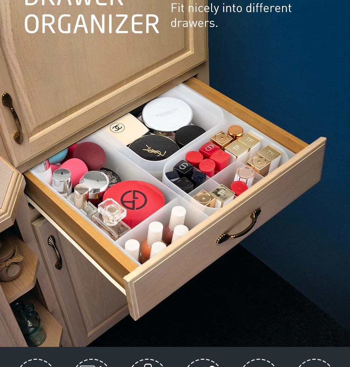 The organizer sitting snugly in an open drawer and filled with makeup products and perfumes
