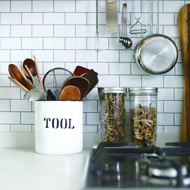 The tiles are visible in the background of a rustic kitchen counter space