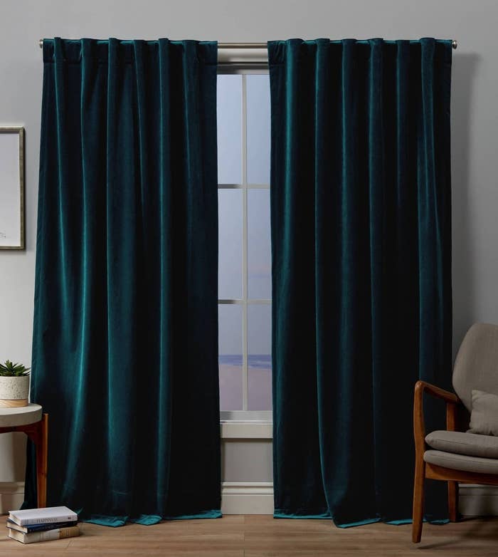 the teal velvet curtains