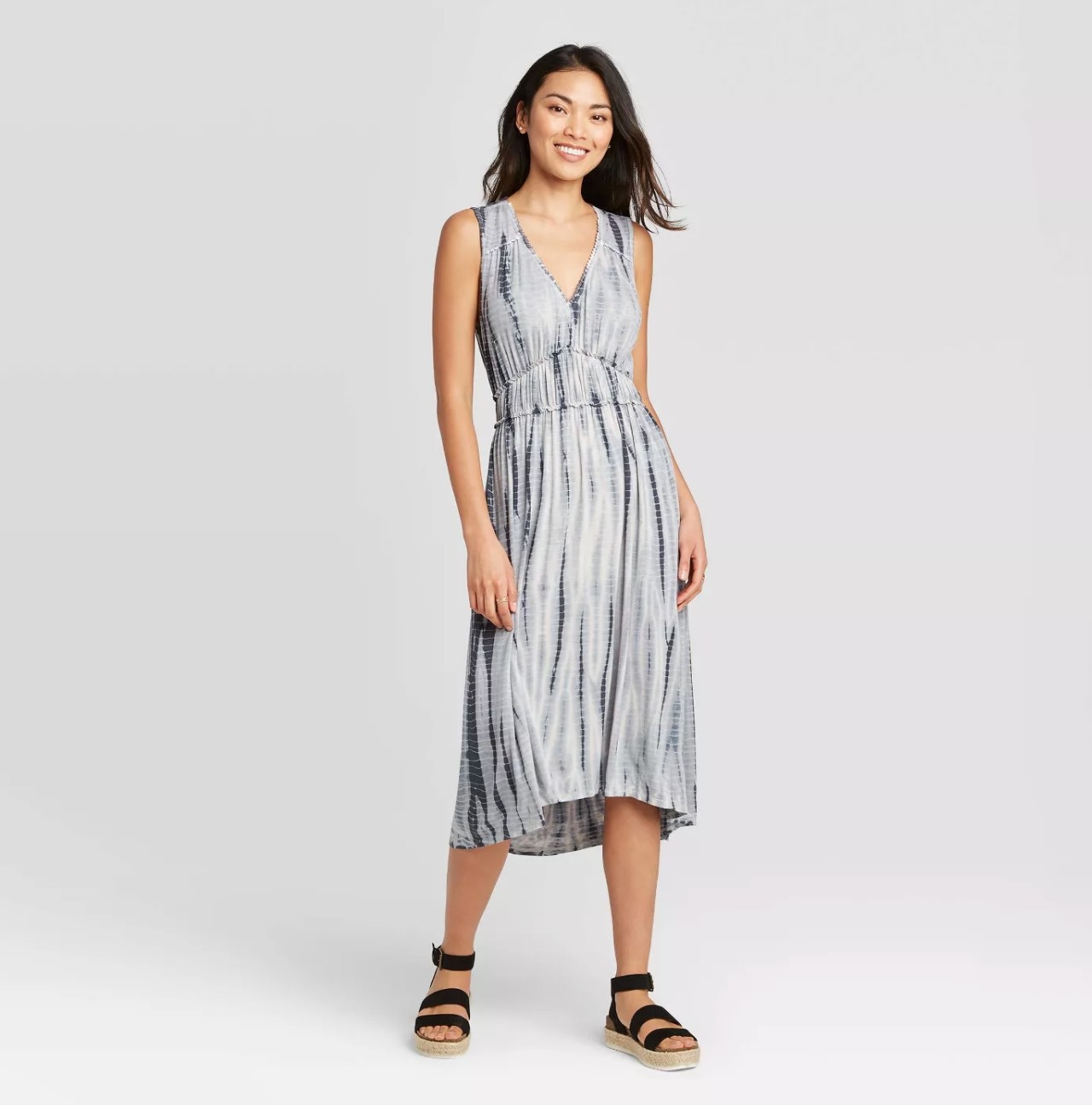 Model wearing the gray tie-dye dress