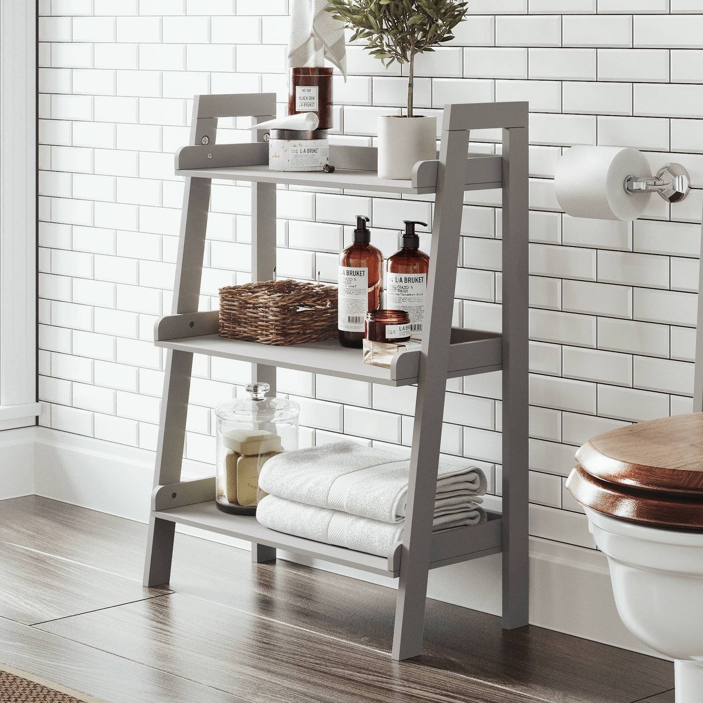 the gray ladder with three steps
