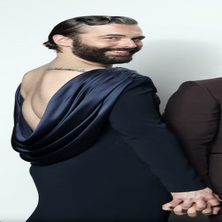 Jonathan wearing a scoop back dress.