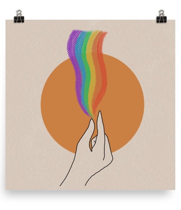 A minimalist image with a hand signing the word &quot;Gay&quot; and a rainbow coming from the tips of the fingers 