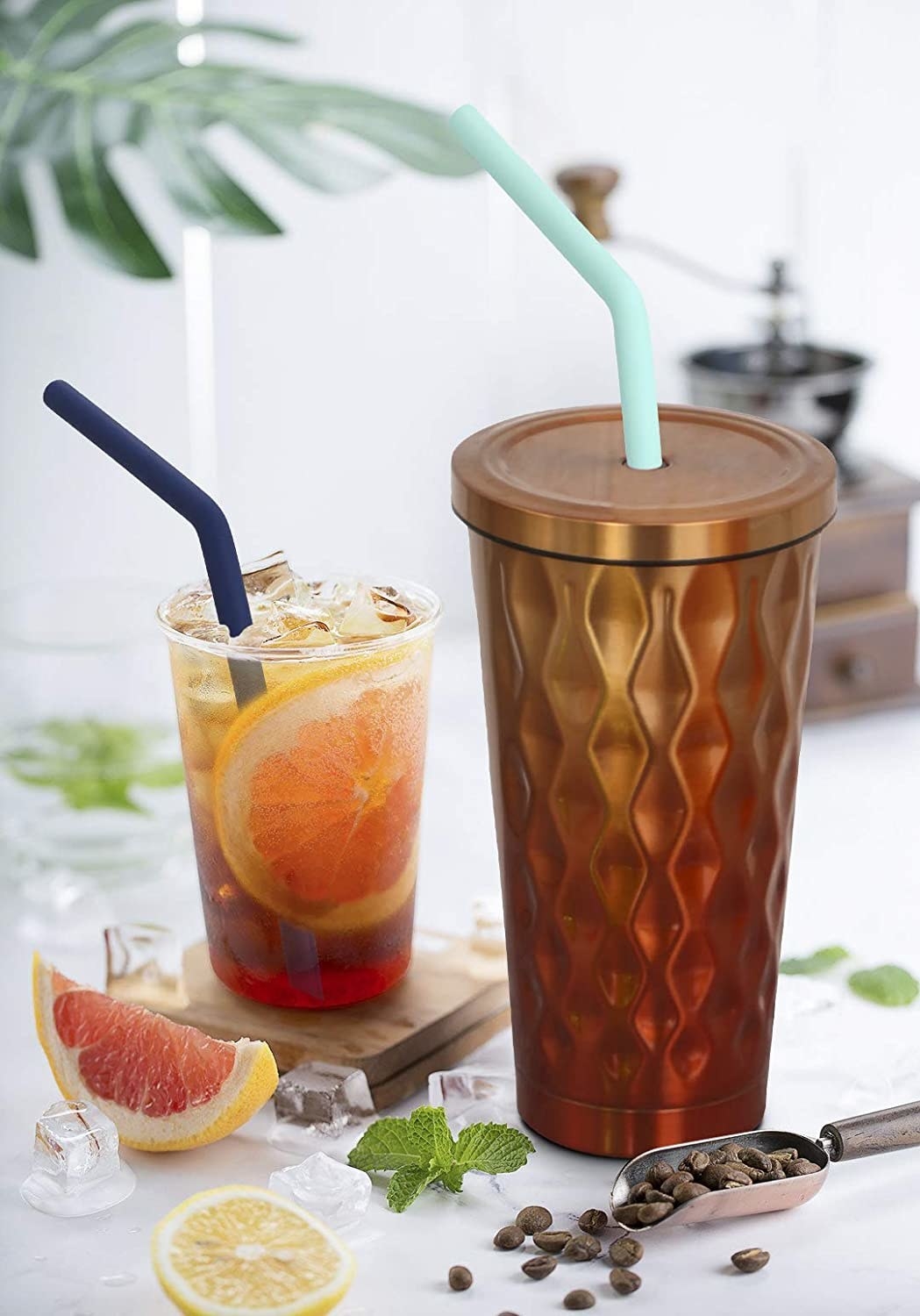 Tumbler and glass both with silicone straws