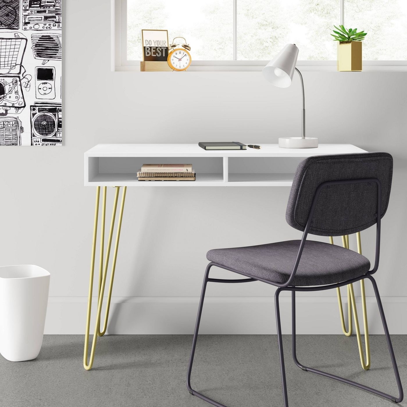 the white desk with gold legs 