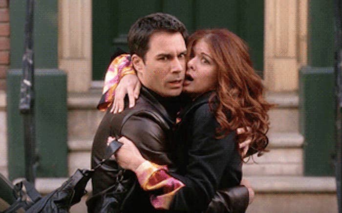 Will and Grace hug on the streets of NYC