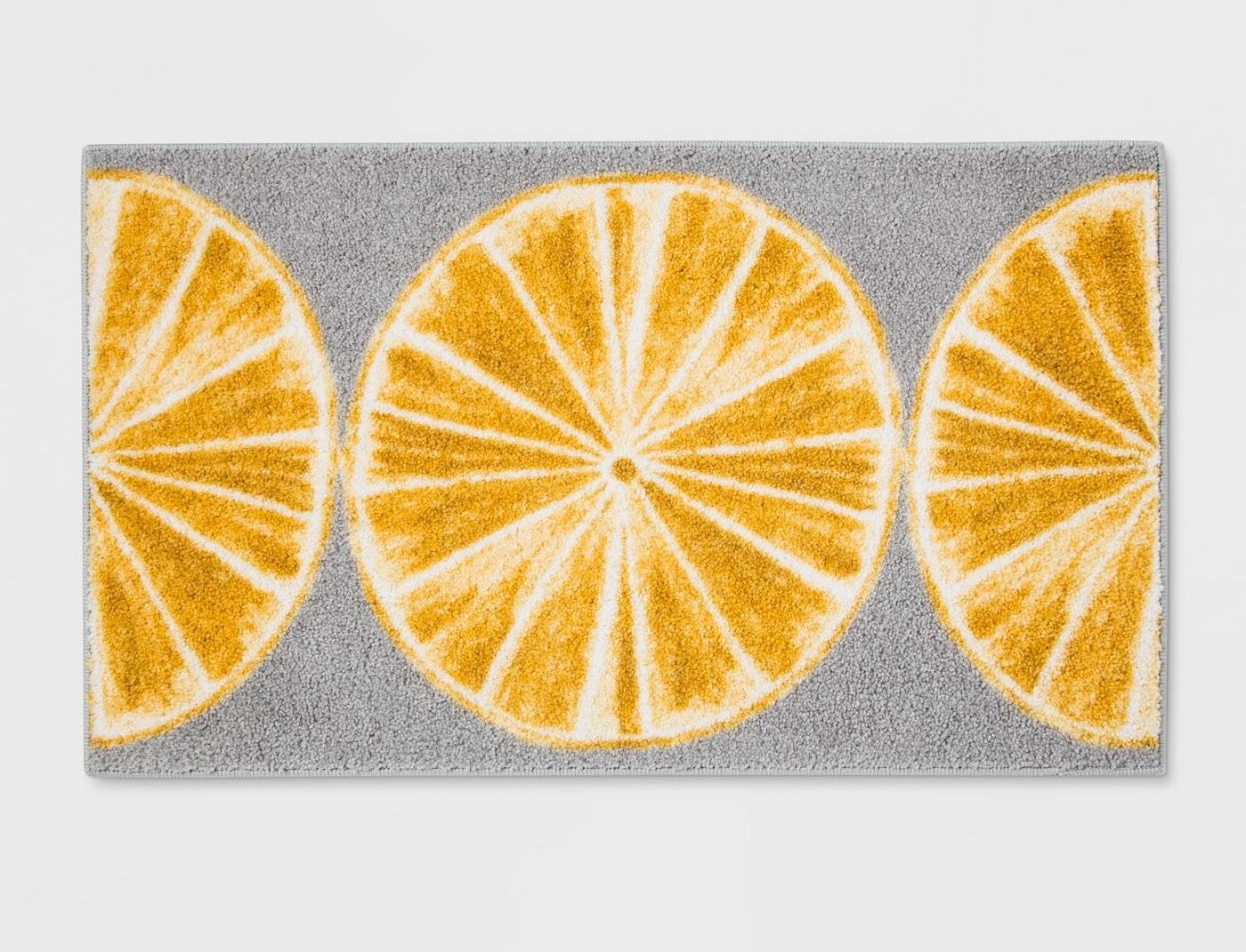 gray rug with yellow lemons