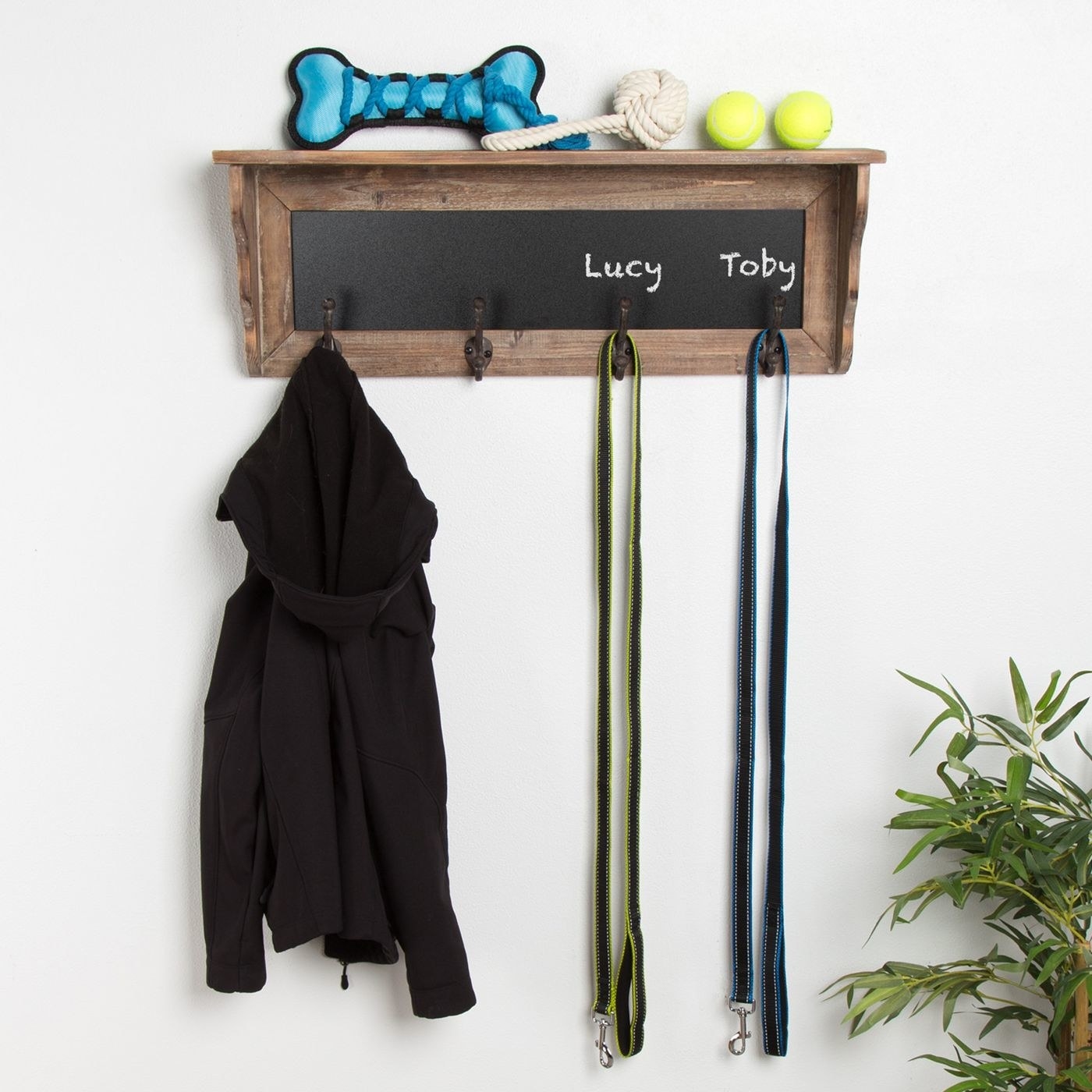 the shelf with a black chalkboard and brown frame 