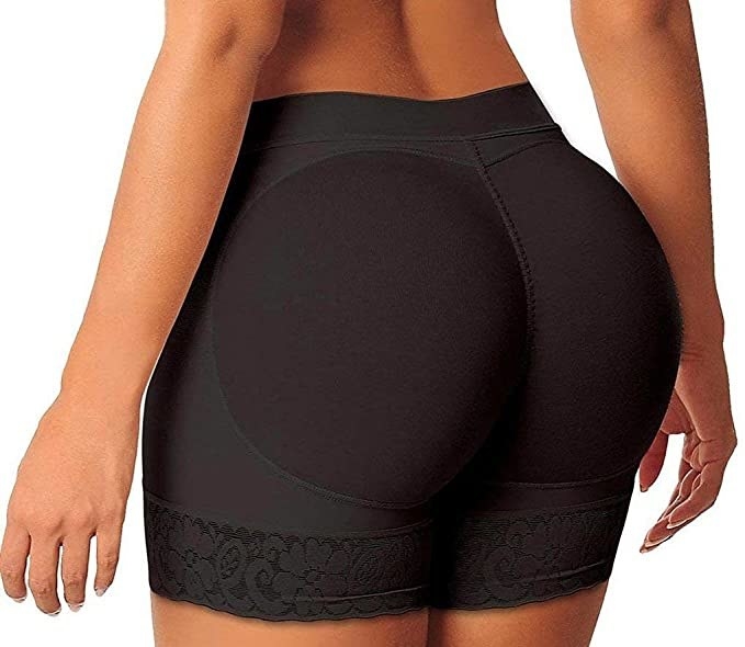 A person is wearing shorts with butt enhancements