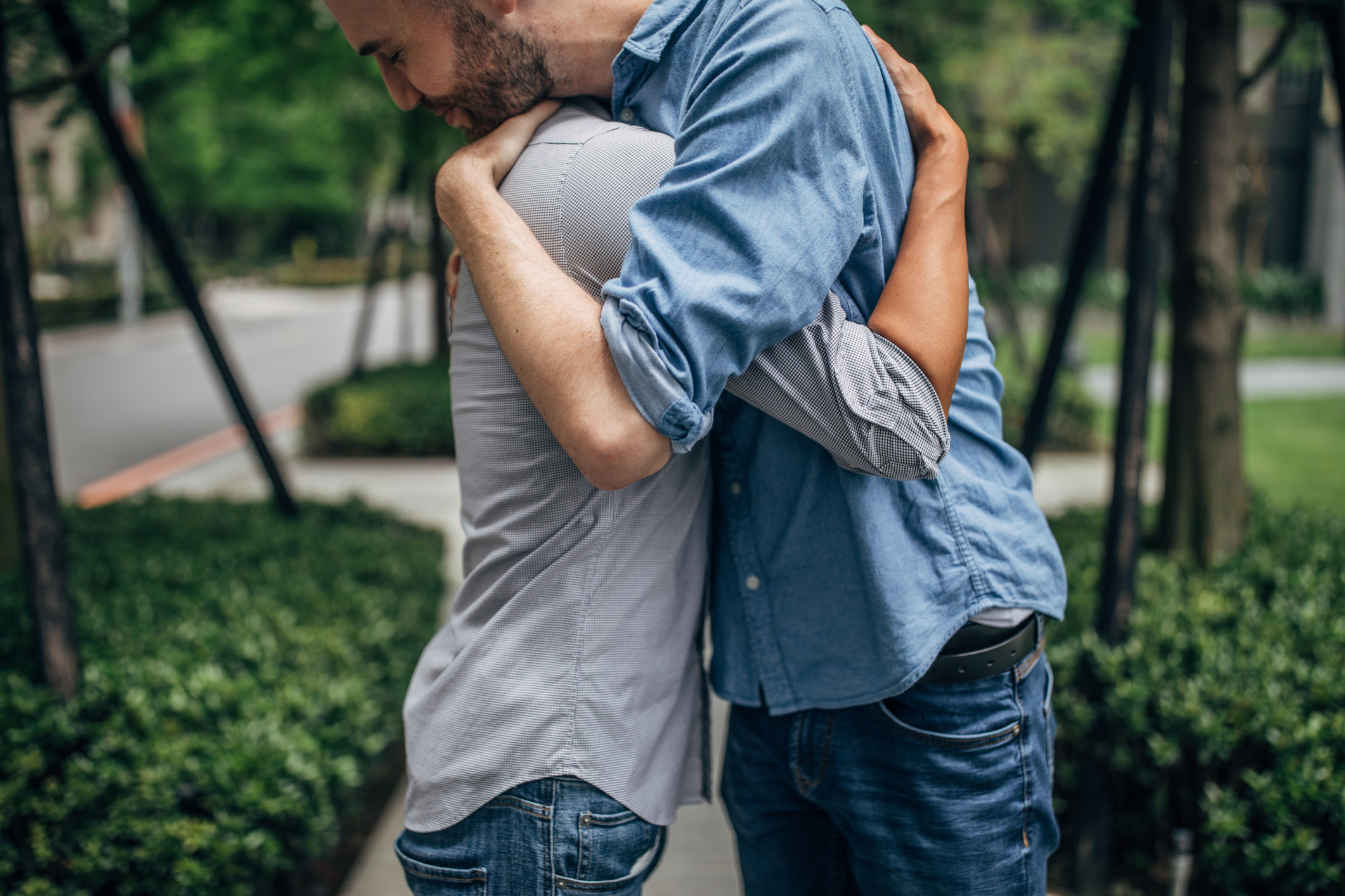 Two men hugging