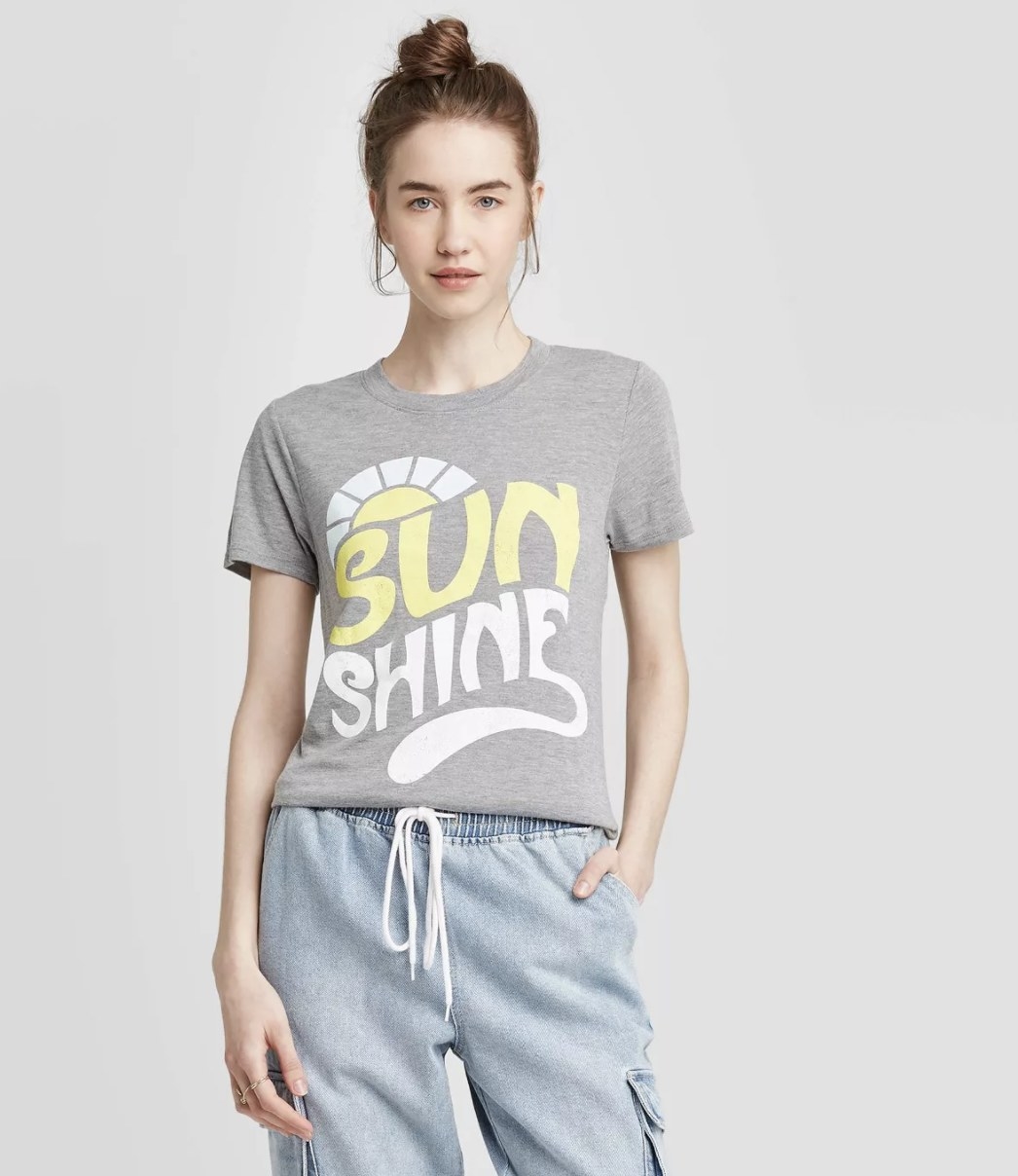 The T-shirt with the word &quot;sunshine&quot; on the front 