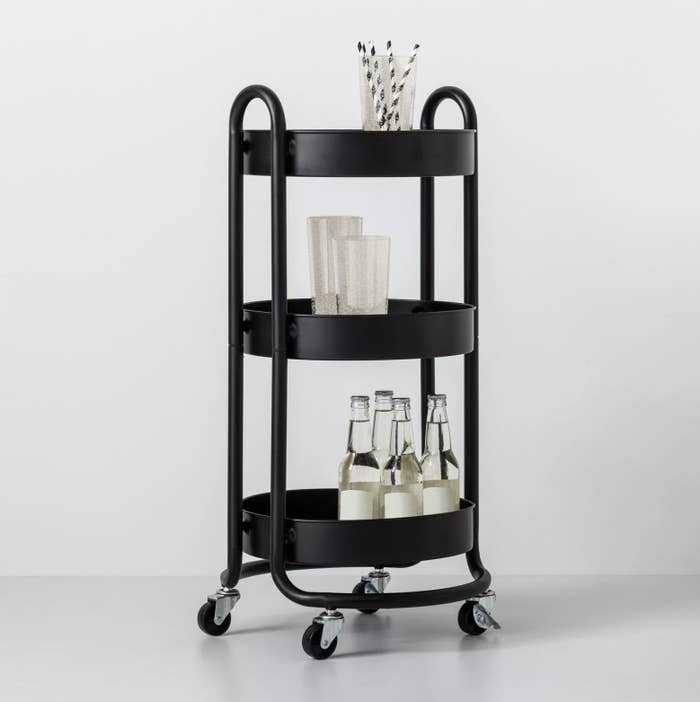The black rolling utility cart