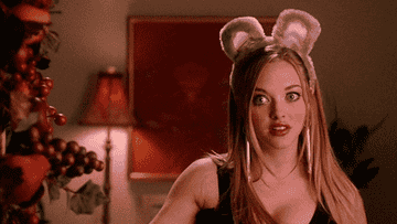 Amanda Seyfried points to bunny ears and says duh as Karen Smith in &quot;Mean Girls&quot;