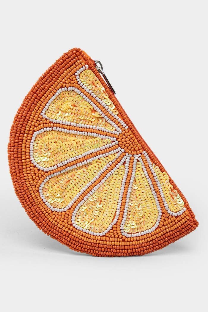 beaded change purse with a zipper that looks like an orange slice