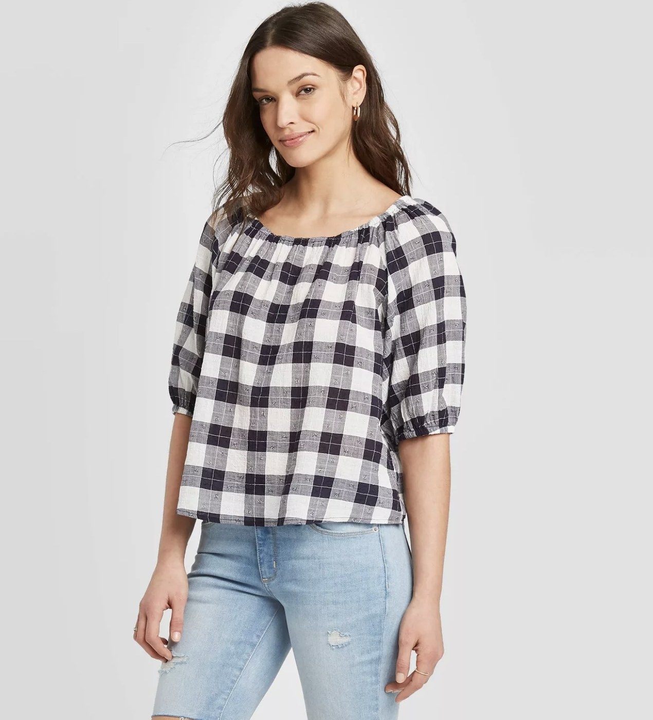 Model wearing the gingham top