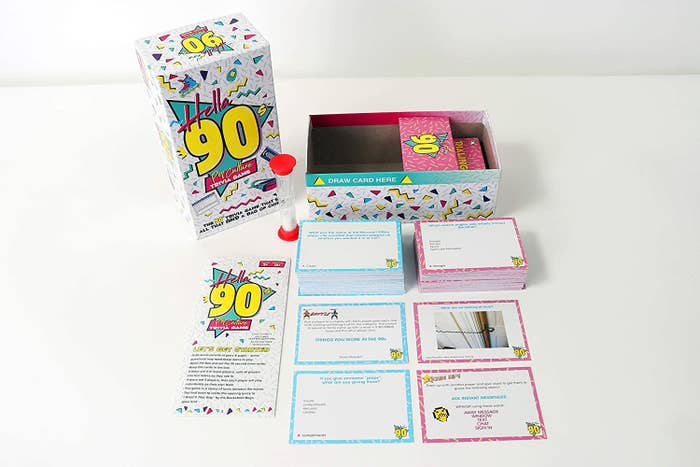 Hella 90s game box with cards displayed 