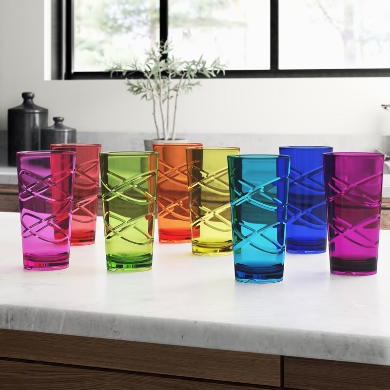 A multi-colored set of drinking glasses 