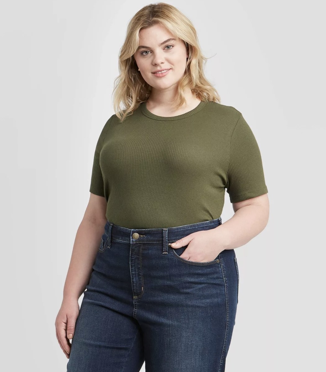 Model in the olive green ribbed T-shirt