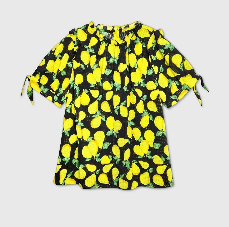 A black shirt with a yellow pear pattern
