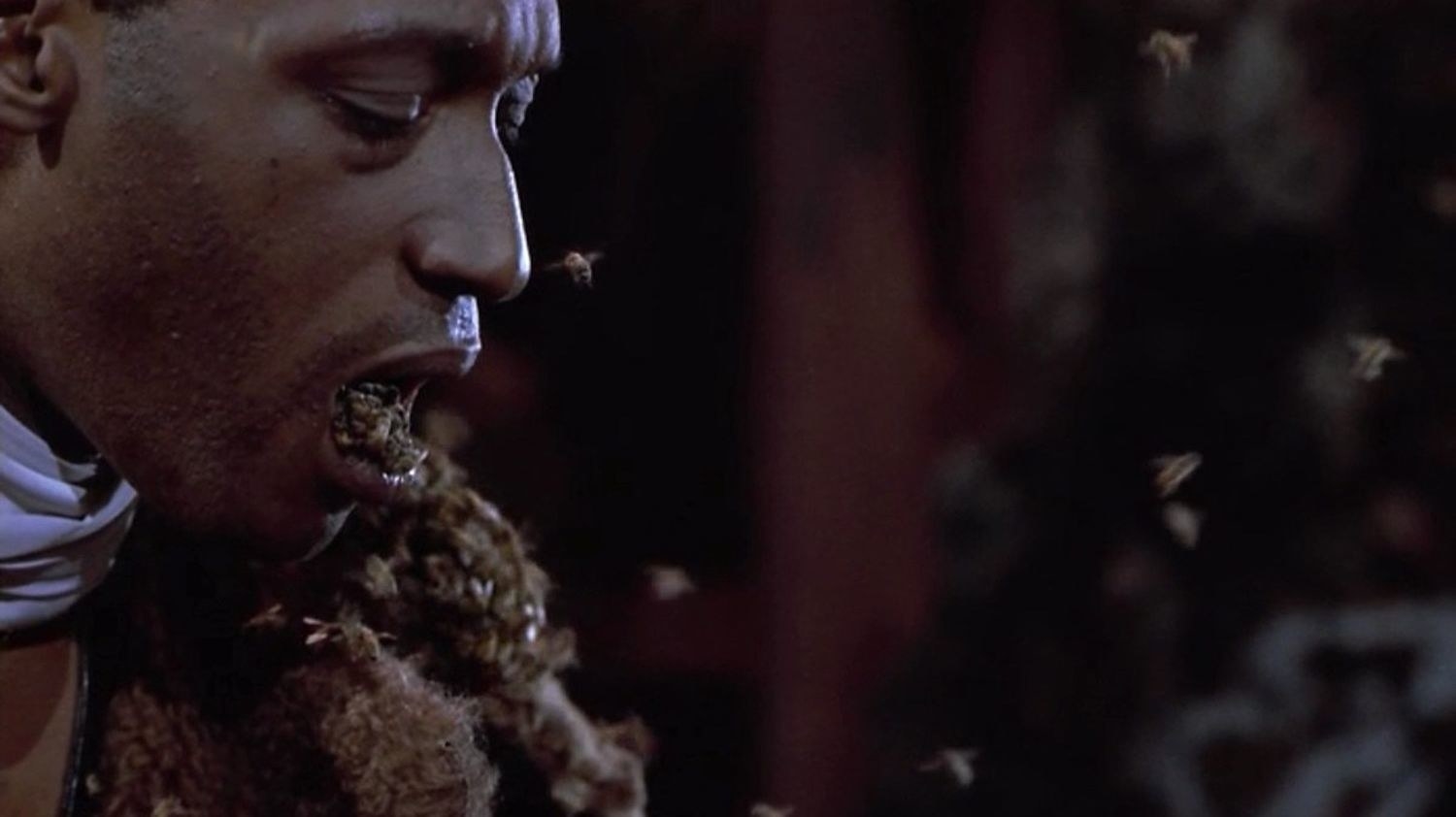 Actor Tony Todd as the titular &quot;Candyman&quot; with a whole bunch of real live bees pouring out of his mouth.