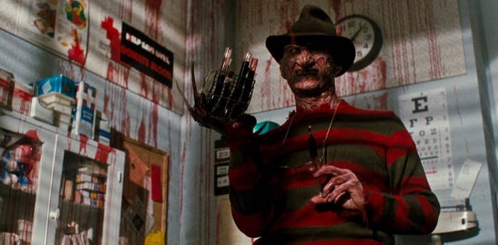 Actor Robert Englund as Freddy Kruger, brandishing his terrifying claws and sporting his usual red and green sweater.