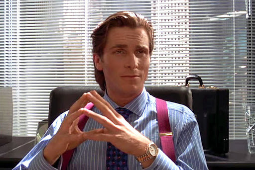 Actor Christian Bale as fictional serial killer Patrick Bateman, sporting a very fancy watch.