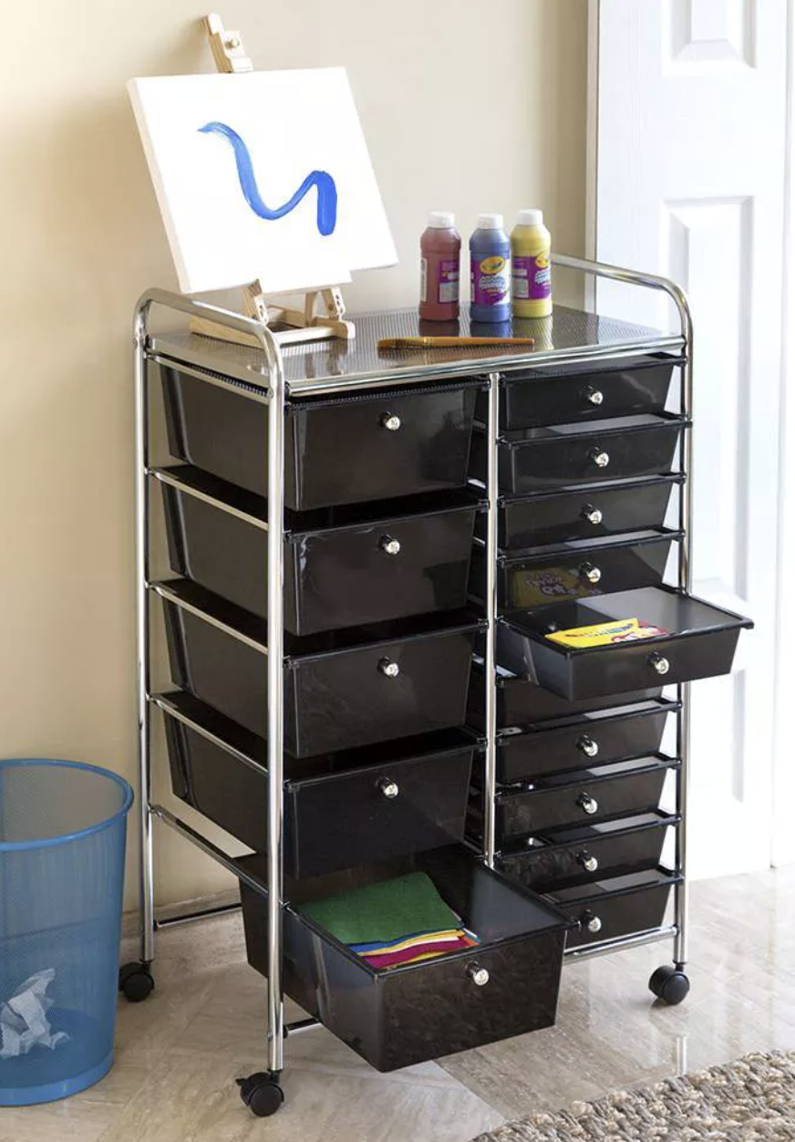 an all black cart with many storage drawers