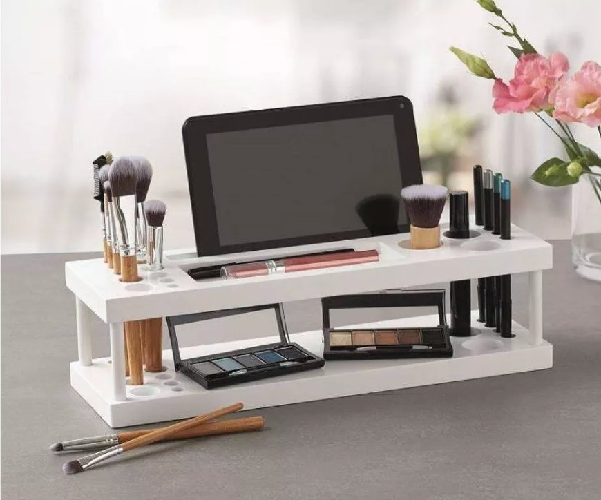 the makeup storage organizer with slots to store brushes and your phone