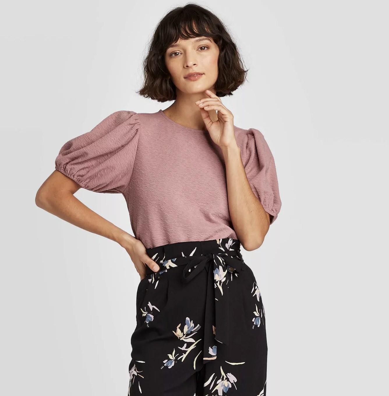 model wearing pink puff sleeve top