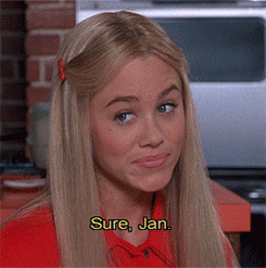 A gif of Marcia Brady from The Brady Bunch movie saying, &quot;Sure, Jan.&quot;