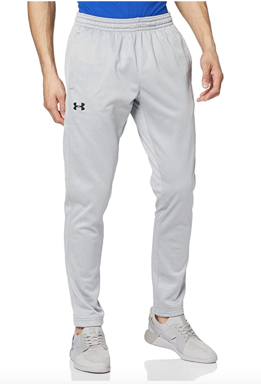 A model in light grey elastic waist athletic pants 