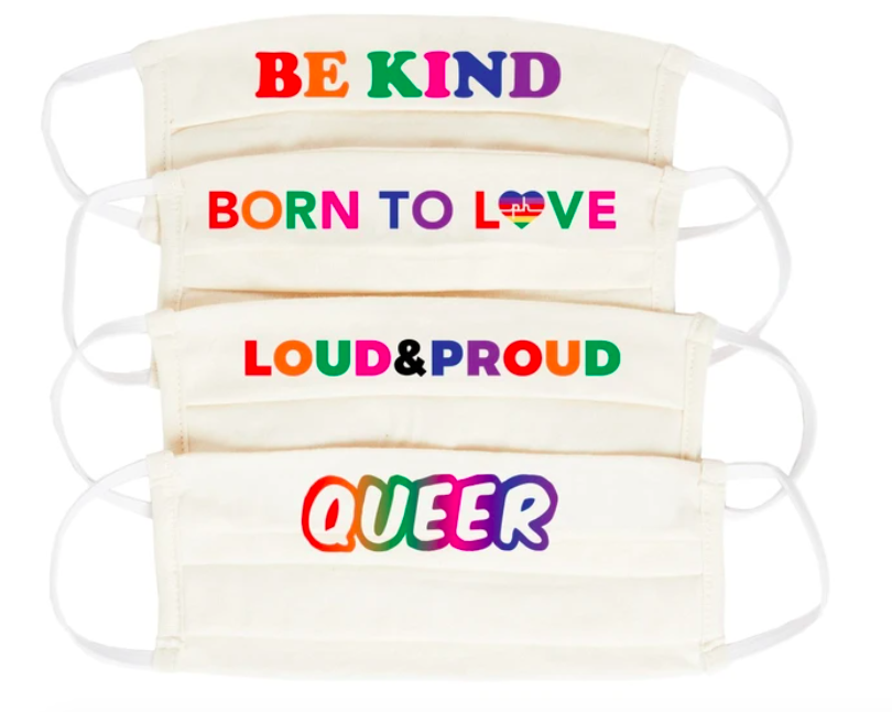 A four pack of cream-colored masks that say &quot;be kind&quot; &quot;born to love&quot; &quot;loud and proud&quot; and &quot;queer&quot;