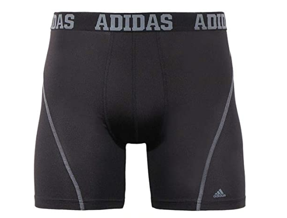 A black pair of boxer briefs that says Adidas on the elastic waistband